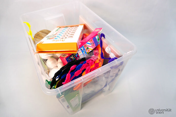 a box filled with materials for handicrafts